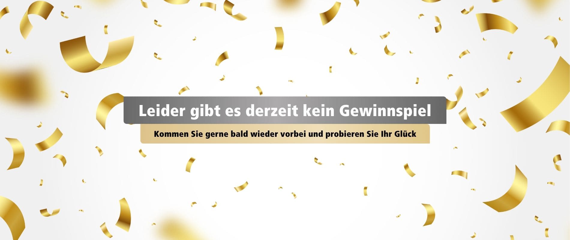 Konfetti in Gold auf weißen Hintergrund "Leider gibt es derzeit kein Gewinnspiel