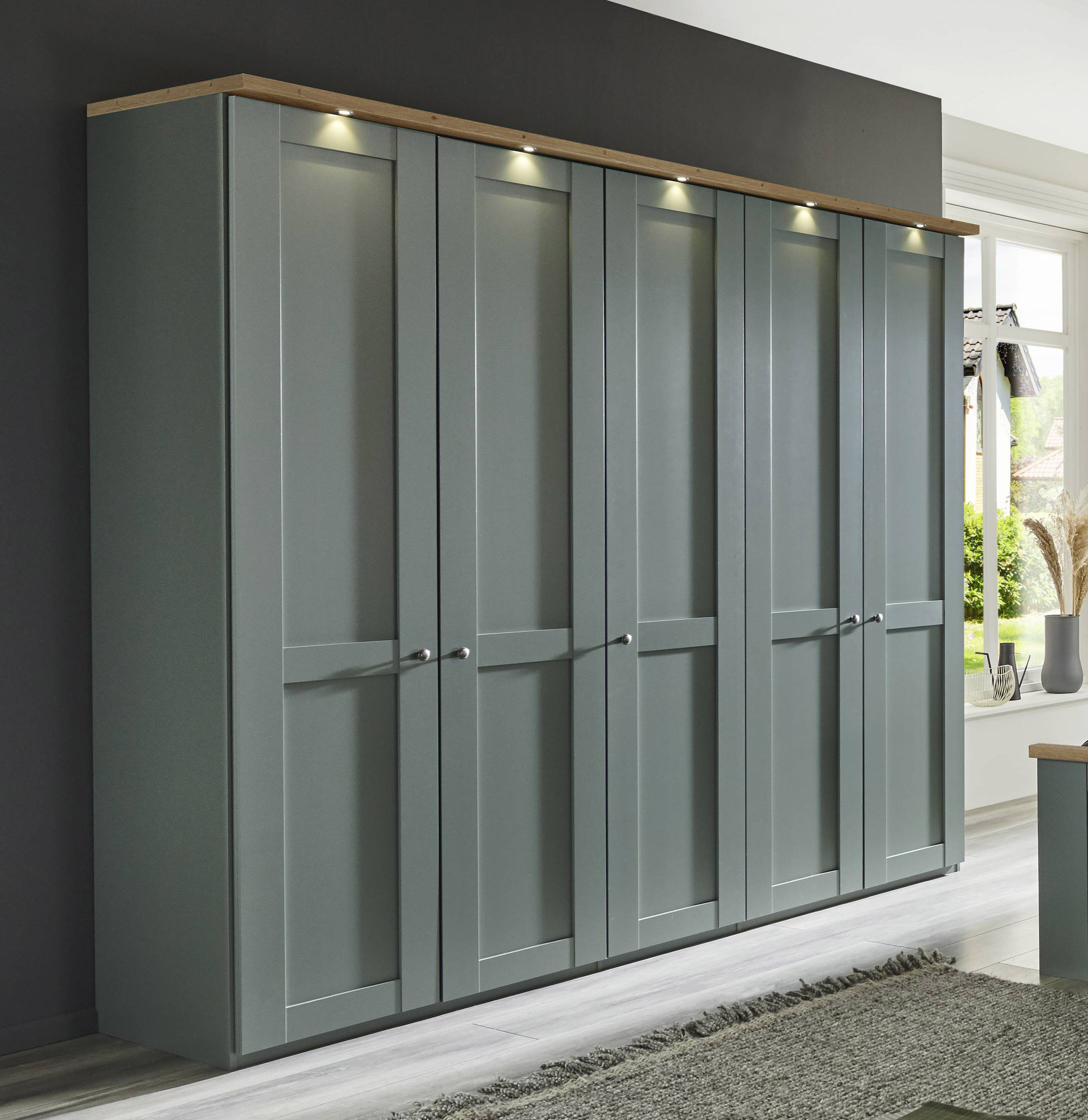 Drehtürenschrank im Salbeigrün-Dekor